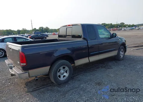 1999 Ford F-150 из США, поврежденный, VIN 1FTRX17W8XNA98372